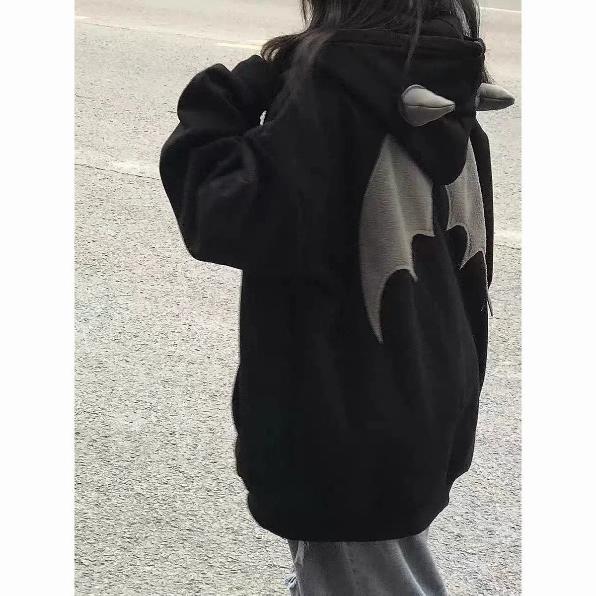 Evil Horns Hoodies Women showcasing a stylish hooded design with unique horn details on the back, perfect for casual wear.